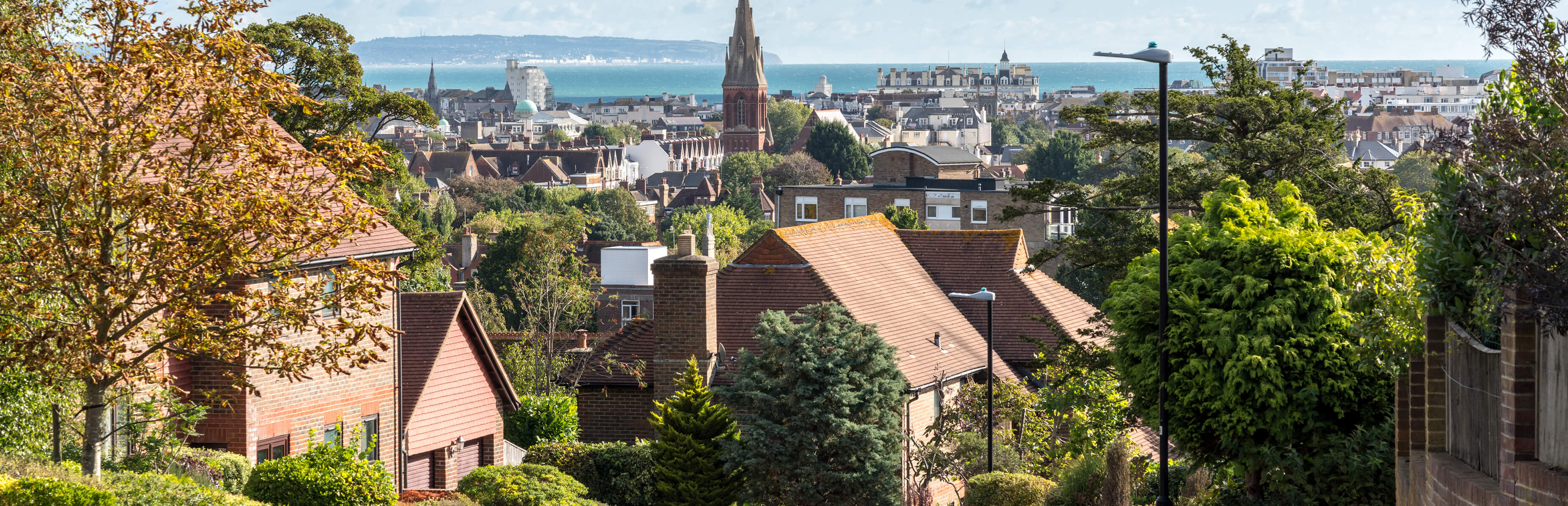 refused planning applications image of a seaside town with the sea visible in the background